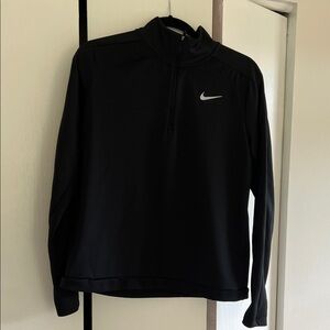 Shirt /Pull over. 3/4 zipper top. Nike /Black and White